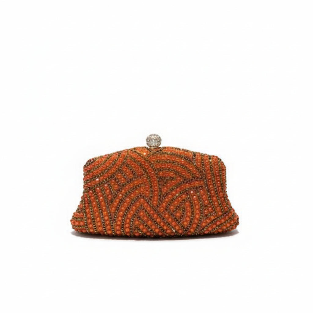 Orange beaded clutch bag on a white surface with 'Lemon house' text above.