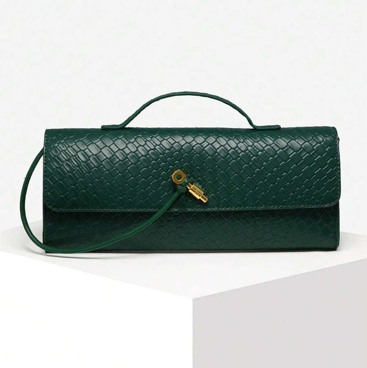 Green handbag with a gold clasp on a white background, featuring the brand 'SIA'.
